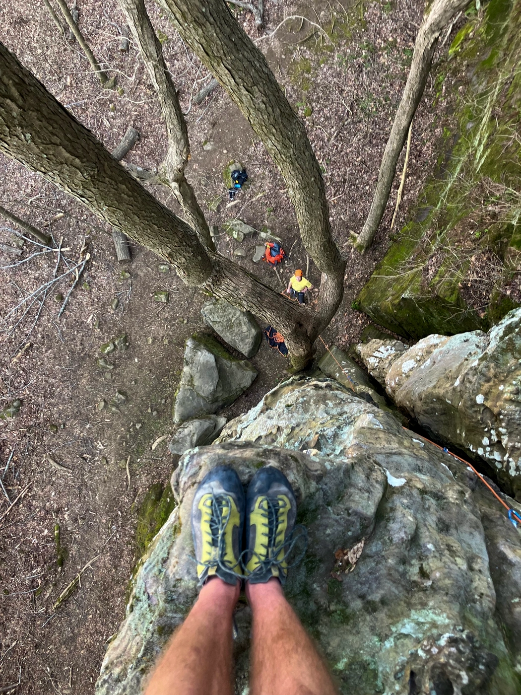 Tommy looking down at Ken (dad) from top of climb at Ferne Clyffe in 2025